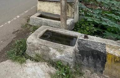 A concrete fountain with a square hole in it

Description automatically generated with medium confidence