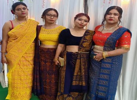 A group of women in traditional indian attire

Description automatically generated