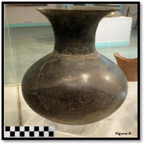 A close-up of a vase

Description automatically generated